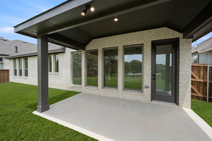 Exterior details and patio area of a home in Redden Farms, Midlothian (Image 3). Exterior details and patio area of a home in Redden Farms, Midlothian (Image 3).