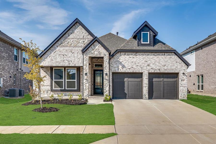 Front exterior of a new home in Edgewood Creek, Celina, TX, highlighting curb appeal (Image 22).