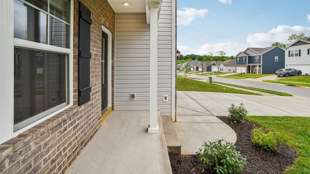 Front exterior of a new home in Archer's Pointe, Johnson City, TN, highlighting curb appeal (Image 23).