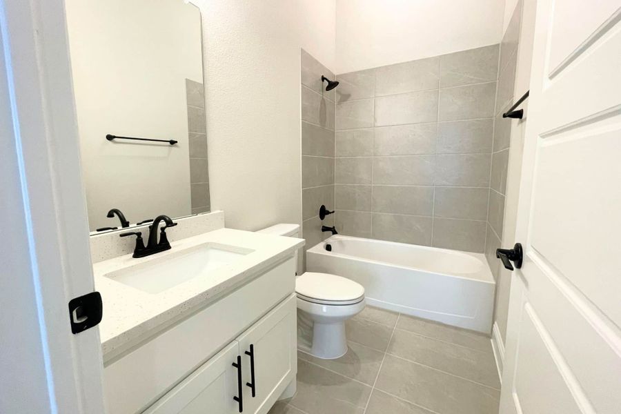 Furnished interior view inside a new home in Whisper Valley, Manor (Image 11).