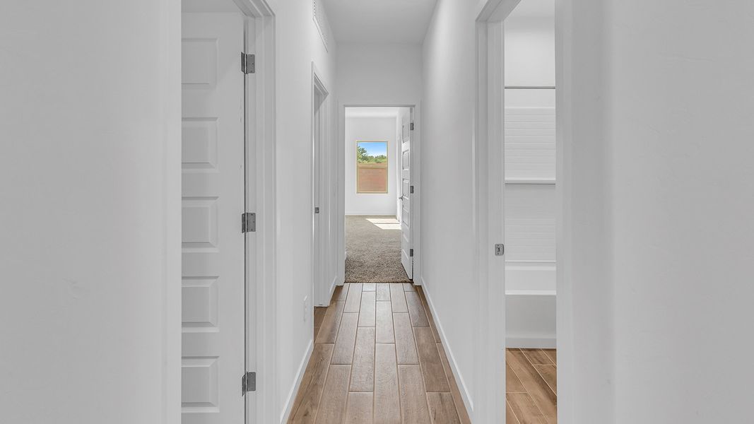 Representative unfurnished interior of a home built from the Parker by D.R. Horton in The Oasis at Rocking K, Vail (Image 34).