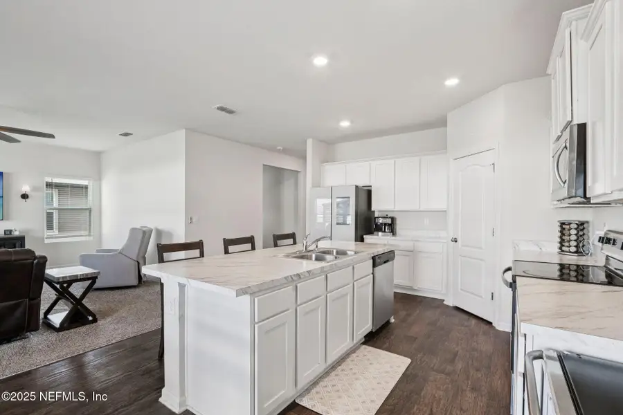 Furnished interior view inside a new home in Cross Creek Express, Green Cove Springs (Image 17).