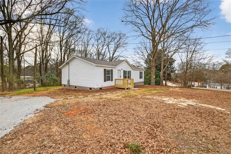 Exterior details and patio area of a home in , Loganville (Image 20).