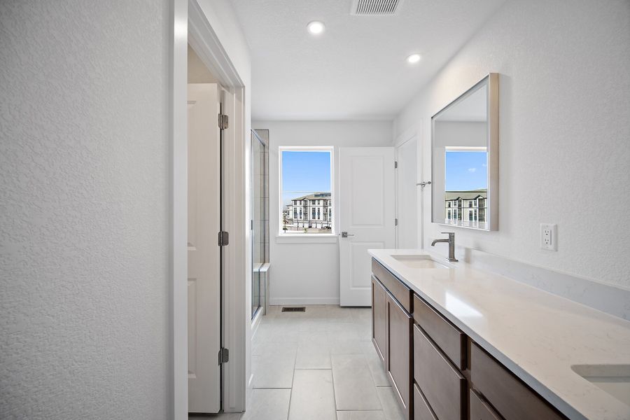 Furnished interior view inside a new home in The Commons at Victory Ridge, Colorado Springs (Image 16).