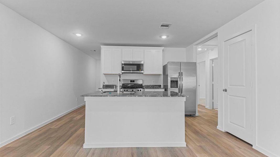 Representative furnished interior of a home built from the ESTERO by D.R. Horton in Canterra Creek 45' and 50' Homesites, Iowa Colony (Image 5).
