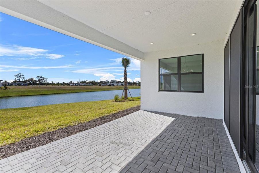 Exterior details and patio area of a home in Woodland Preserve, Parrish (Image 2).