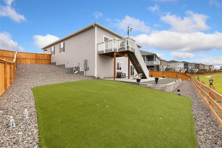 Front exterior of a new home in Lakeside Canyon, Mead, CO, highlighting curb appeal (Image 20).