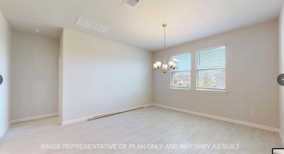 Empty room with visible vents, baseboards, a chandelier, and light wood-type flooring Empty room with visible vents, baseboards, a chandelier, and light wood-type flooring