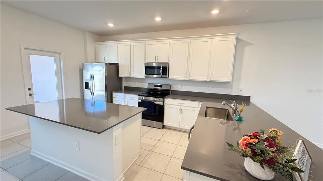 Furnished interior view inside a new home in , Kissimmee (Image 6).