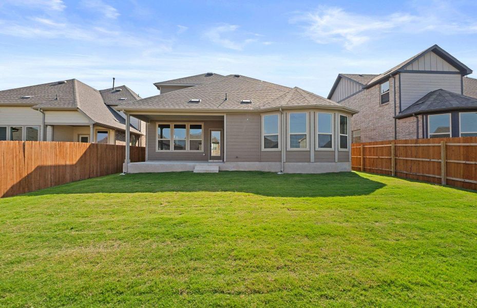 Exterior details and patio area of a home in Saddleback at Santa Rita Ranch, Liberty Hill (Image 3).