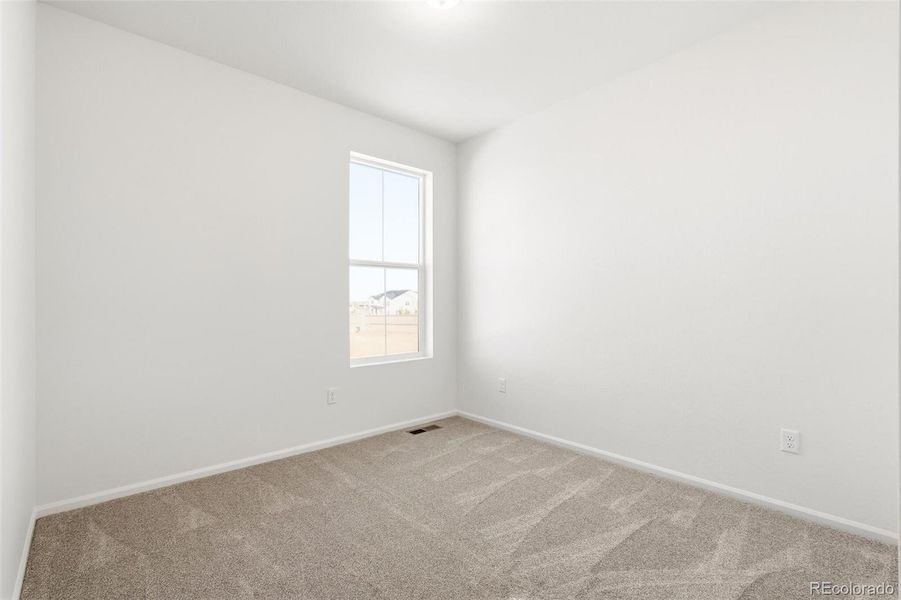 Spacious, unfurnished interior of a new home in The Nest Classic at Canyon Creek, Erie (Image 29).