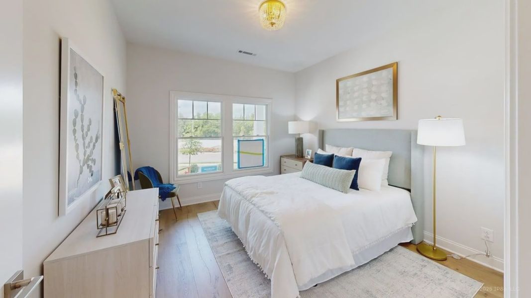 Representative furnished interior of a home built from the Promenade by Epcon Communities in The Courtyards at Stewarts Creek, Smyrna (Image 11).