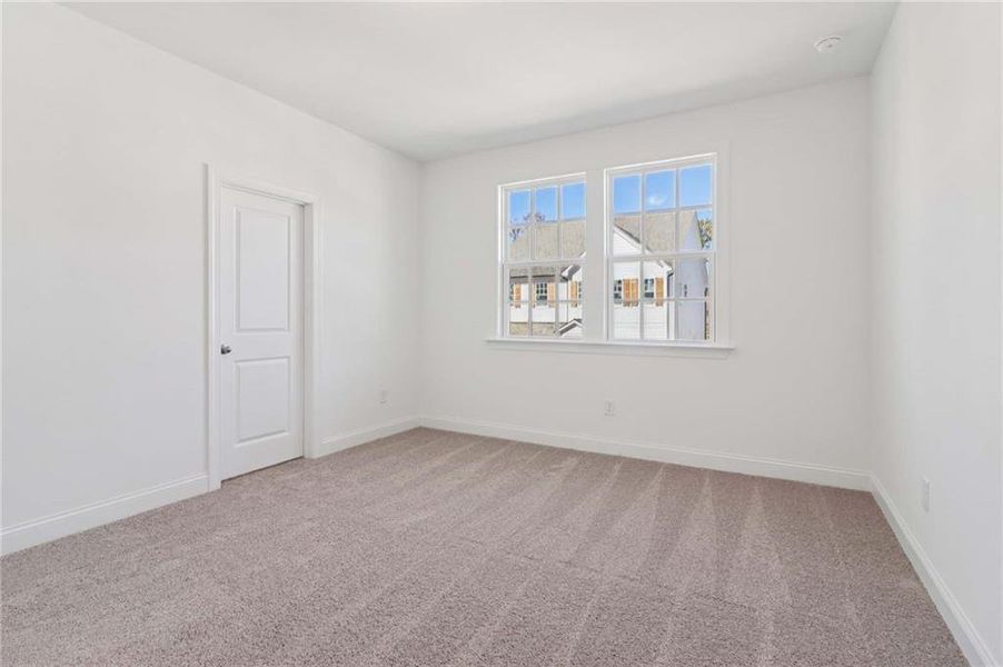 Spacious, unfurnished interior of a new home in East Harbor II at Chestatee, Dawsonville (Image 22).