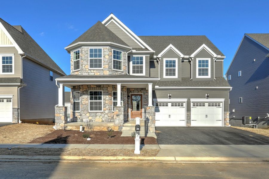 Representative exterior photo of a completed home built from the Manchester by Keystone Custom Homes in Preserve at Mayes Meadow, Cornelius, NC (Image 8).
