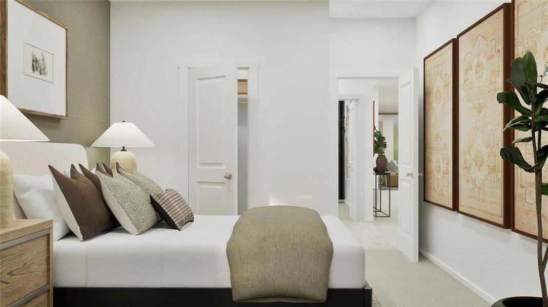 Bedroom featuring baseboards and carpet