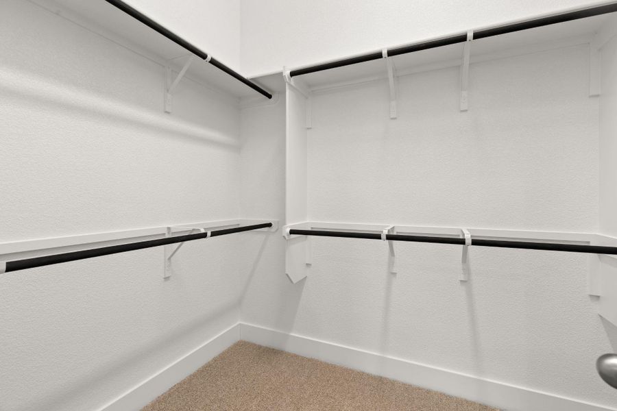 Walk-in closet in Primary Bedroom - Representative Photo