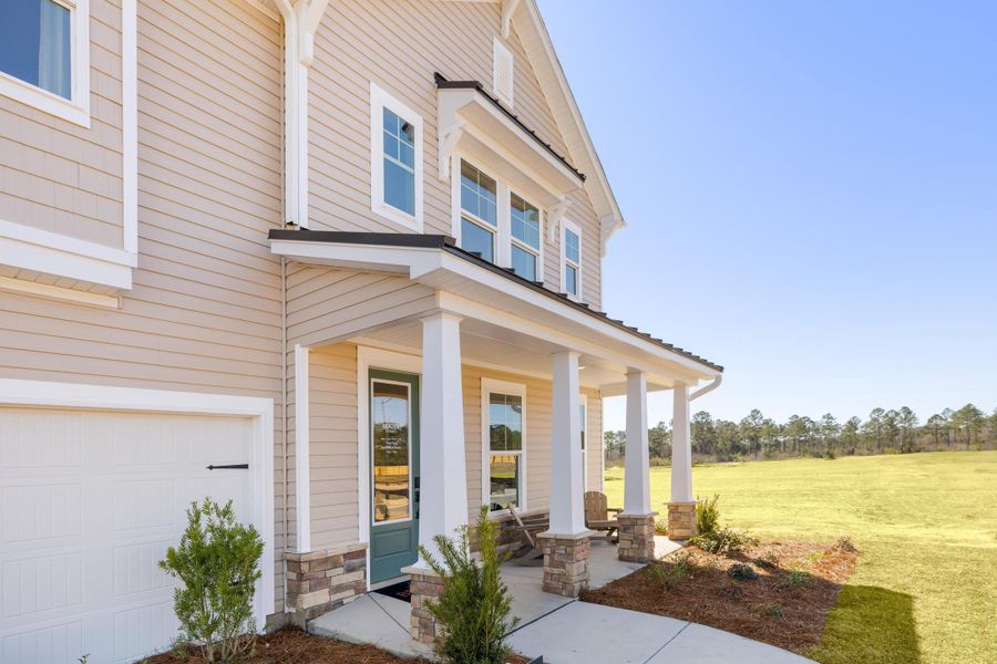 Exterior details and patio area of a home in The Oaks, Goose Creek (Image 3).