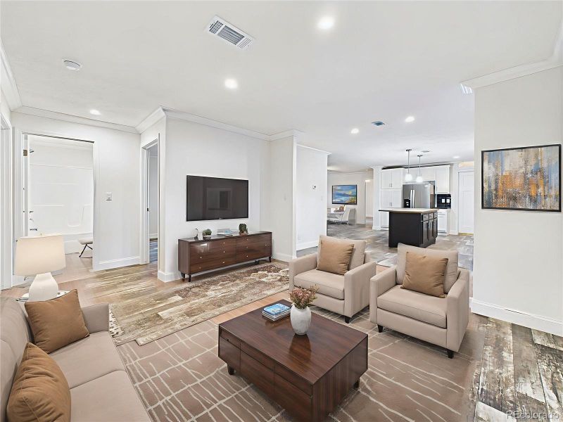 Virtually Staged Open bonus space off the kitchen, ideal as a second living room, playroom, or home office.