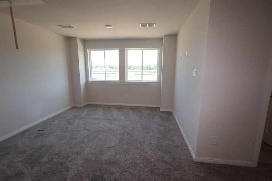 Spacious, unfurnished interior of a new home in Sundance Cove Lakeside - Overlook View Collection, Crosby (Image 6).