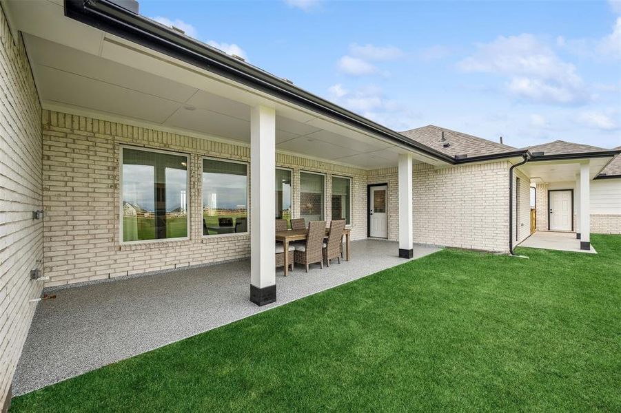 Covered patio in backyard (*Photo not of actual home and used for illustration purposes only.)