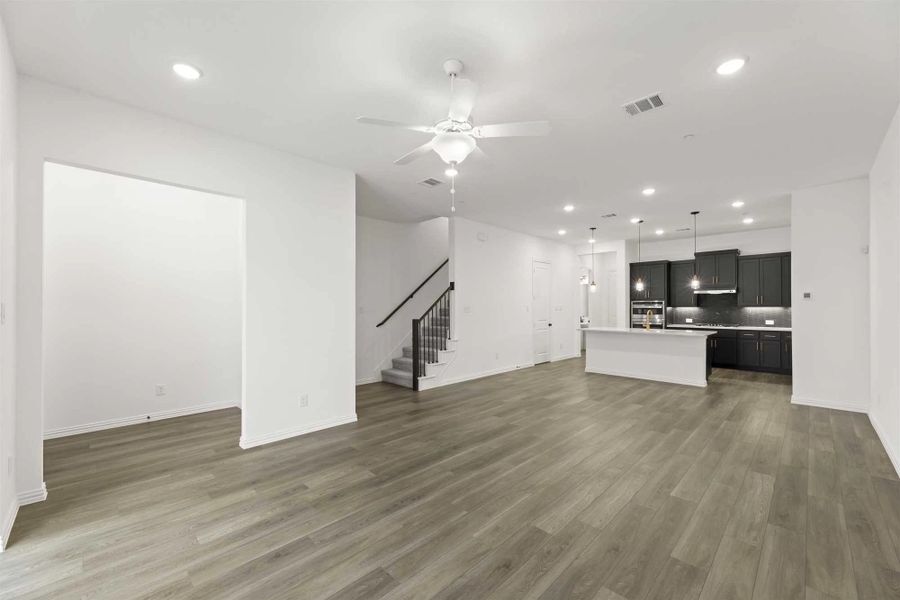 Open Kitchen-Living-Dining Room Representative Photo featuring the Noir Collection