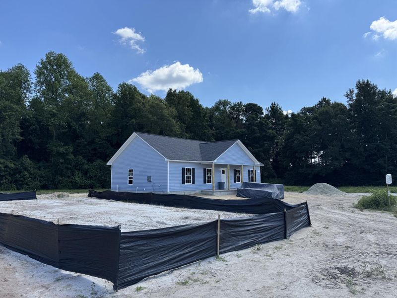 Front exterior of a new home in , St. George, SC, highlighting curb appeal (Image 15). Front exterior of a new home in , St. George, SC, highlighting curb appeal (Image 15).