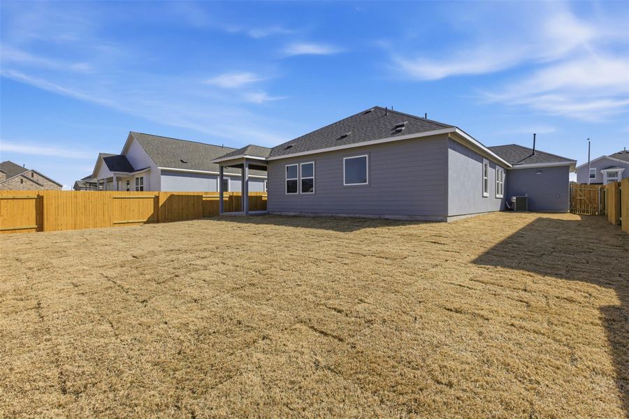 Exterior details and patio area of a home in Enclave at Cele, Pflugerville (Image 22).