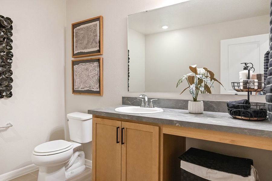 Extended vanity with knee space at bath 2