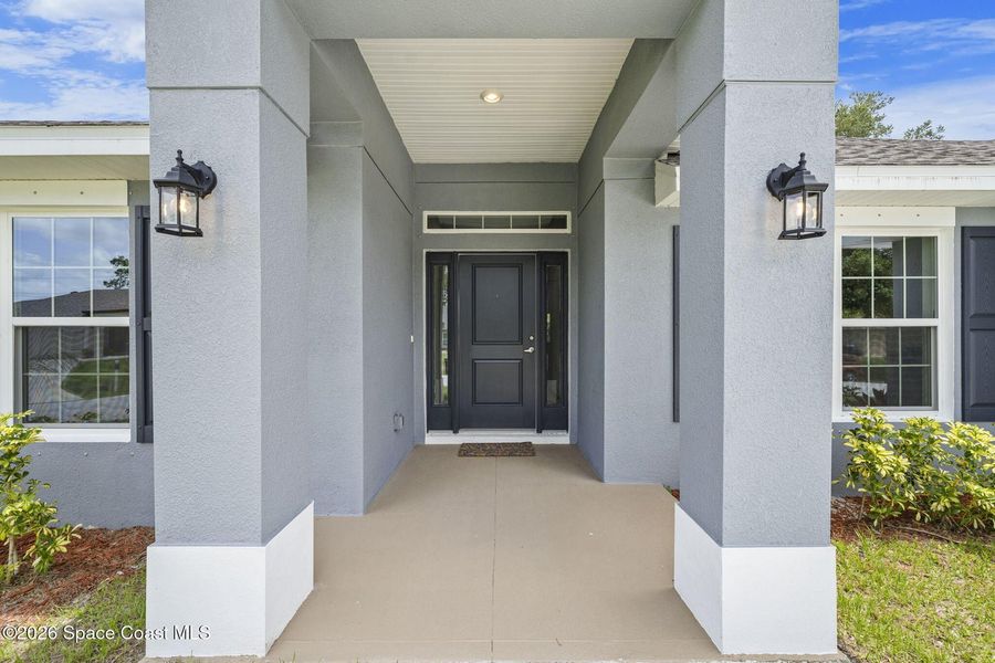 Exterior details and patio area of a home in Palm Bay, Palm Bay (Image 2). Exterior details and patio area of a home in Palm Bay, Palm Bay (Image 2).