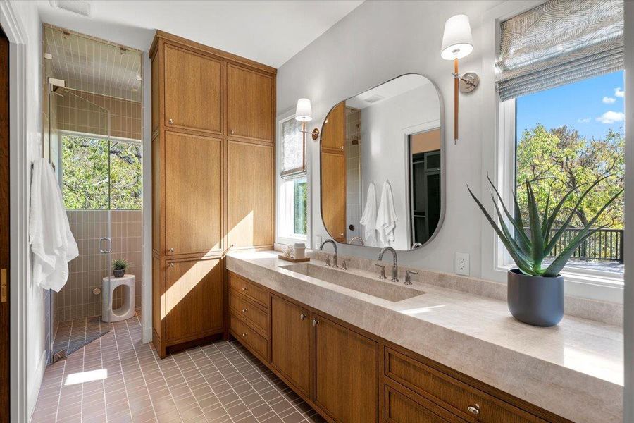 The Taj Mahal leathered countertop with integrated stone sink is stunning.