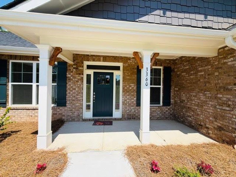 Exterior details and patio area of a home in Tuscany Hills, Douglasville (Image 23). Exterior details and patio area of a home in Tuscany Hills, Douglasville (Image 23).