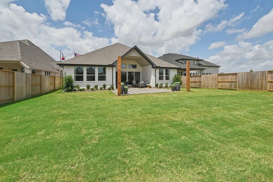 Exterior details and patio area of a home in Meridiana 60's, Manvel (Image 25).