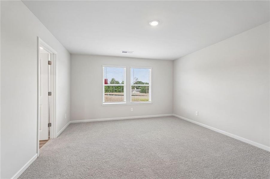 Spacious, unfurnished interior of a new home in Northwoods at Mirror Lake, Villa Rica (Image 41).