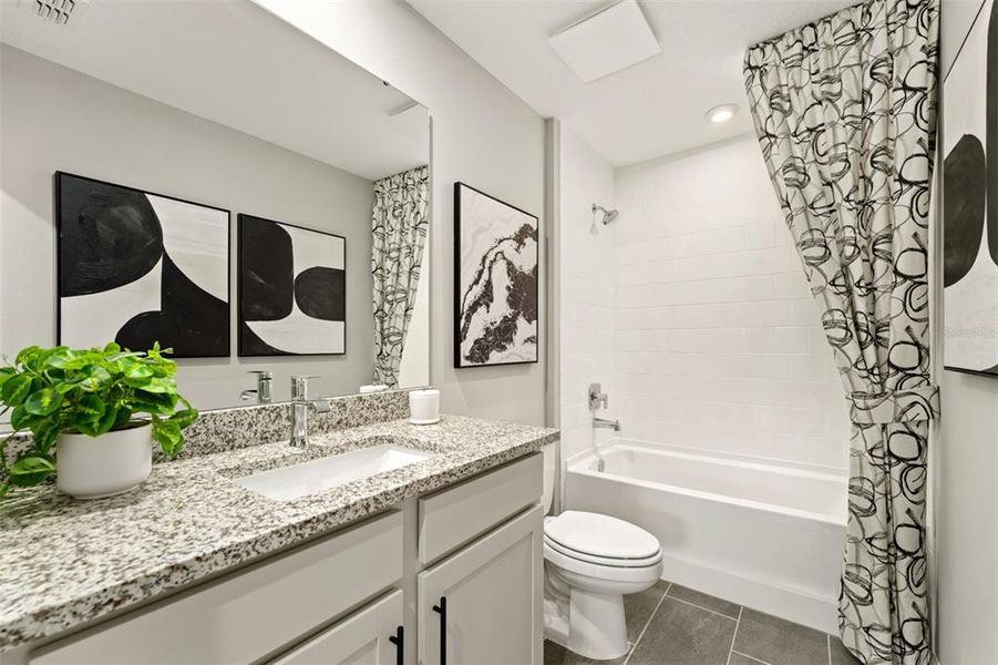 Furnished interior view inside a new home in Meridian Parks, Orlando (Image 14). Furnished interior view inside a new home in Meridian Parks, Orlando (Image 14).