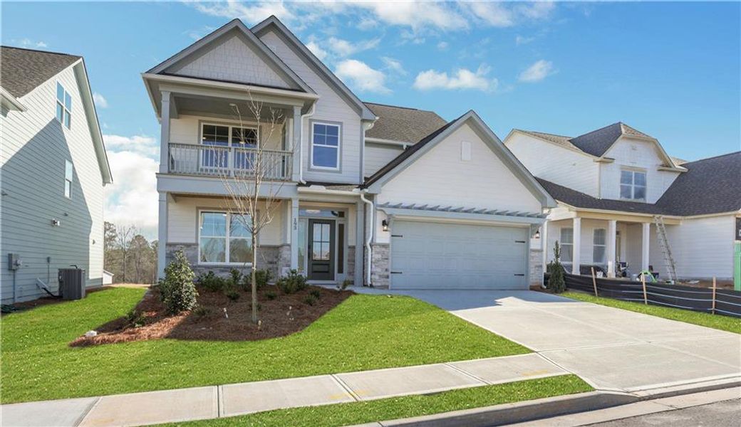 Front exterior of a new home in Twin Lakes, Hoschton, GA, highlighting curb appeal (Image 22).
