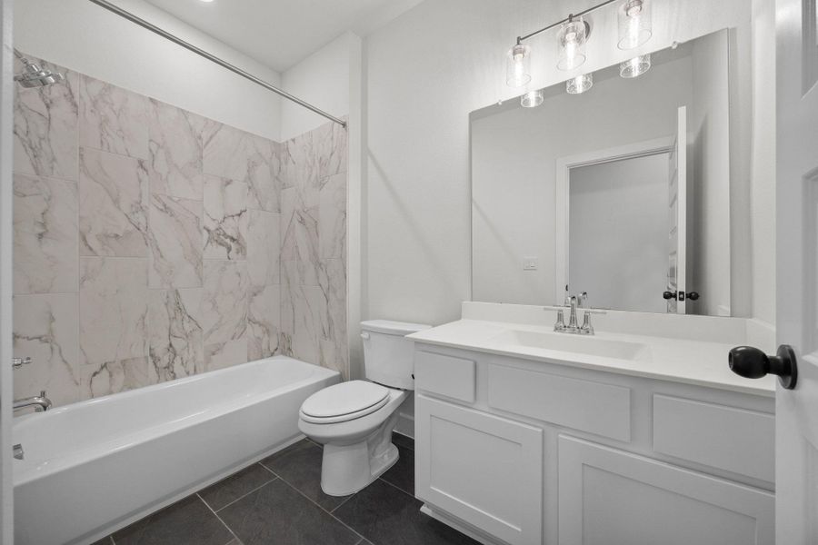 Furnished interior view inside a new home in Parmer Ranch - 60', Georgetown (Image 13).