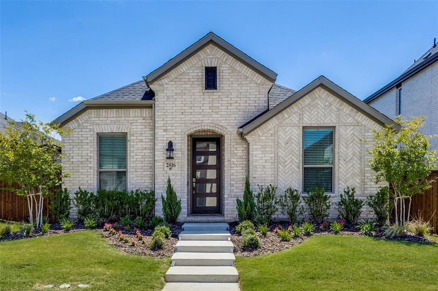 Front exterior of a new home in , Celina, TX, highlighting curb appeal (Image 20).