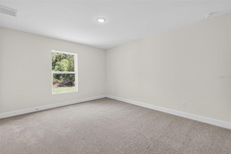 Spacious, unfurnished interior of a new home in , Port Charlotte (Image 19).