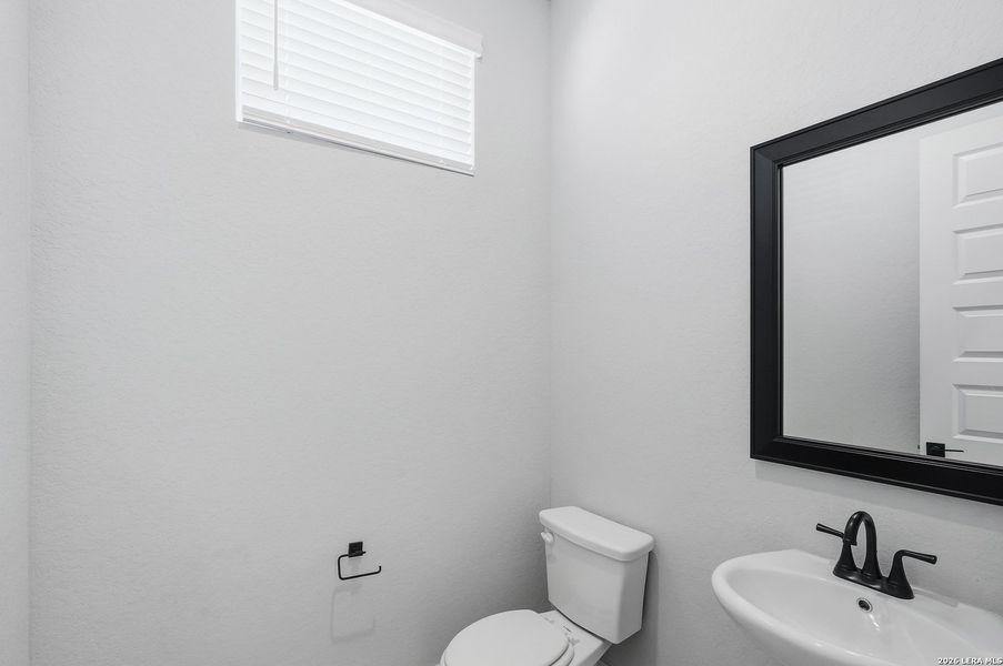 Furnished interior view inside a new home in Potranco Oaks, Castroville (Image 29).