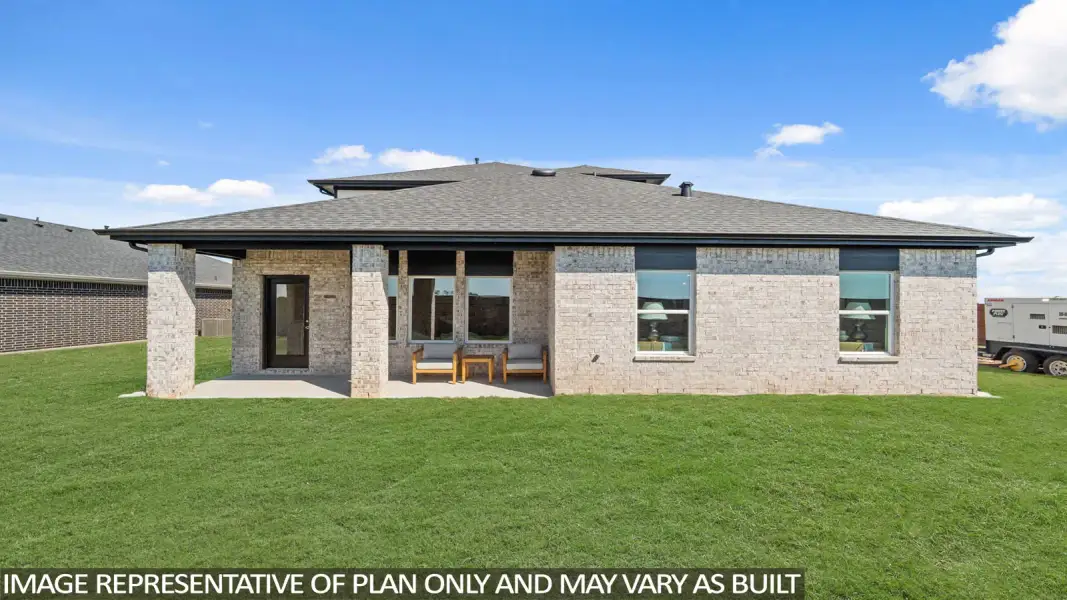 Exterior details and patio area of a home in Sunterra Lakes, Brookshire (Image 3).