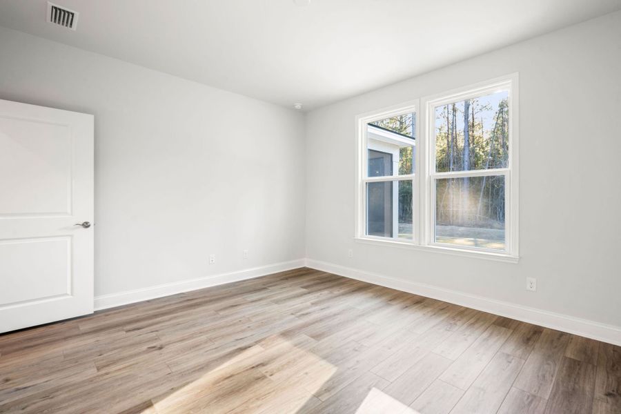 Spacious, unfurnished interior of a new home in Sun City Hilton Head, Bluffton (Image 27).