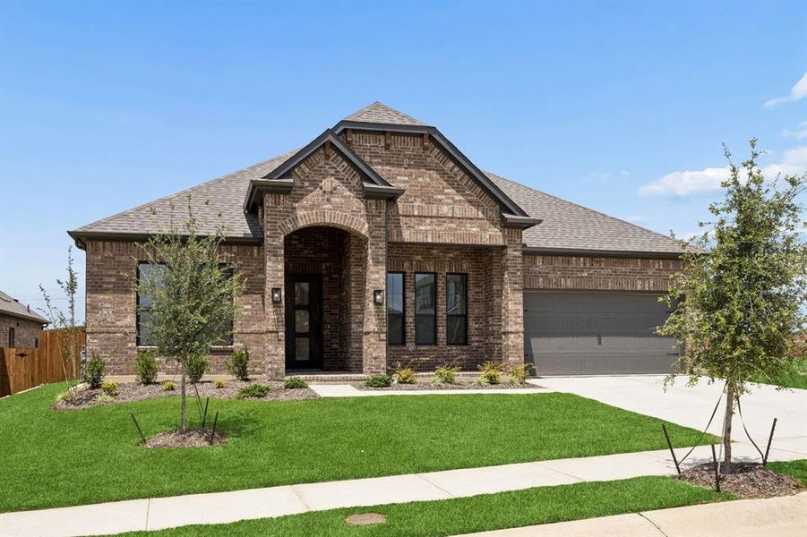 Front exterior of a new home in Country Lakes, Denton, TX, highlighting curb appeal (Image 2). Front exterior of a new home in Country Lakes, Denton, TX, highlighting curb appeal (Image 2).