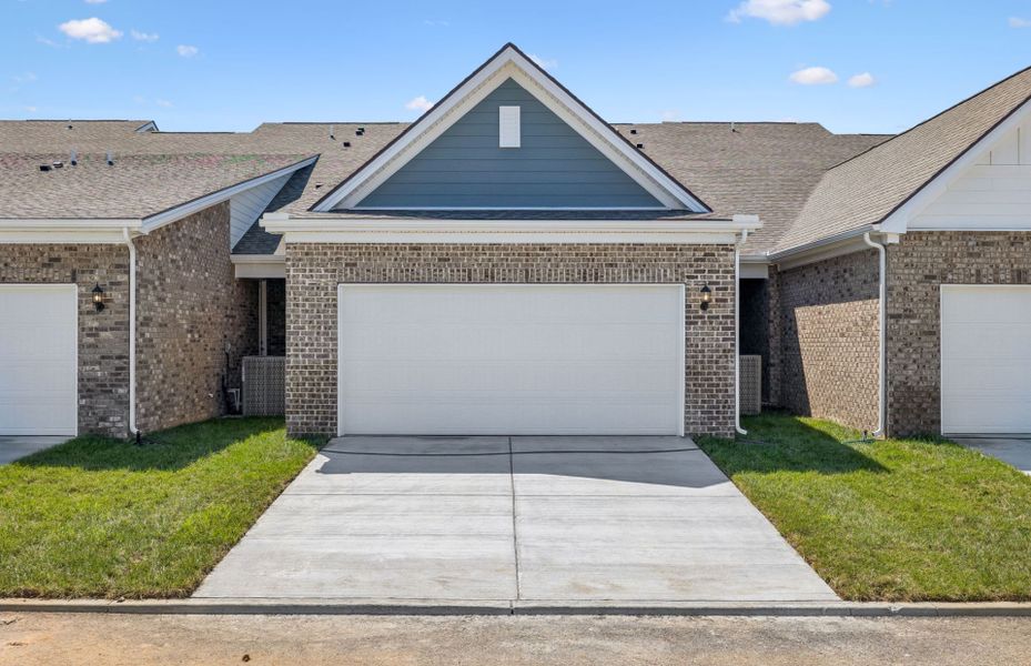 Front exterior of a new home in Bradshaw Farms Reserve, Mount Juliet, TN, highlighting curb appeal (Image 22). Front exterior of a new home in Bradshaw Farms Reserve, Mount Juliet, TN, highlighting curb appeal (Image 22).