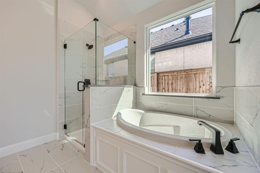 Bathroom with separate shower and tub