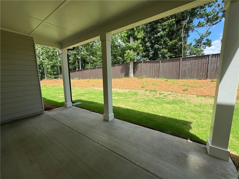 Exterior details and patio area of a home in Rosewood Lake Preserve, Hoschton (Image 19).