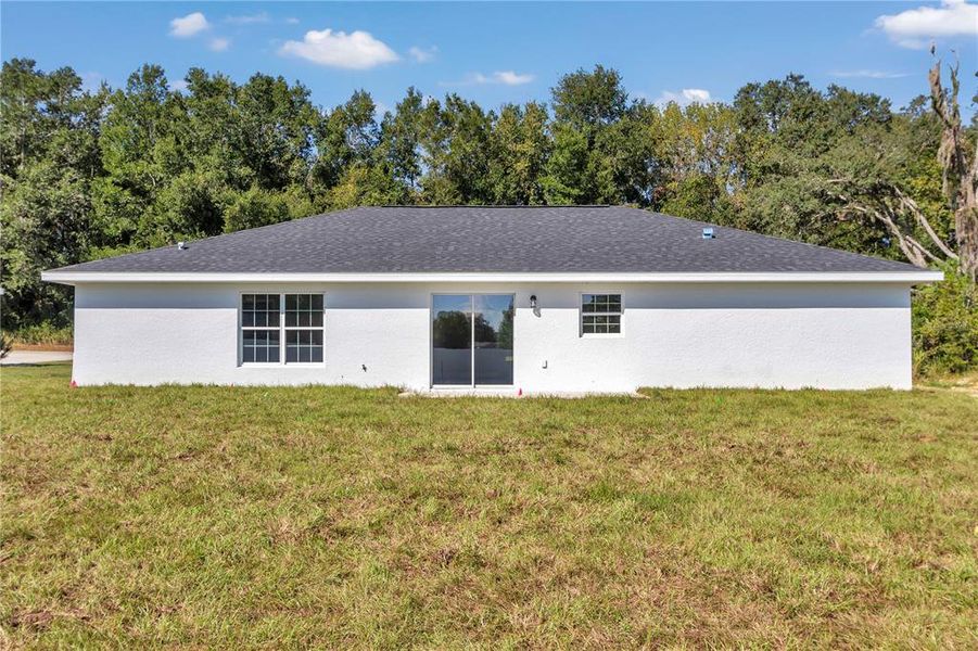 Exterior details and patio area of a home in , Ocala (Image 16).