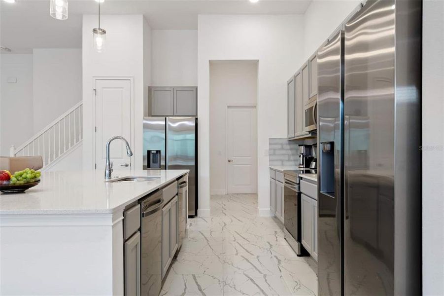 Furnished interior view inside a new home in , Kissimmee (Image 9).
