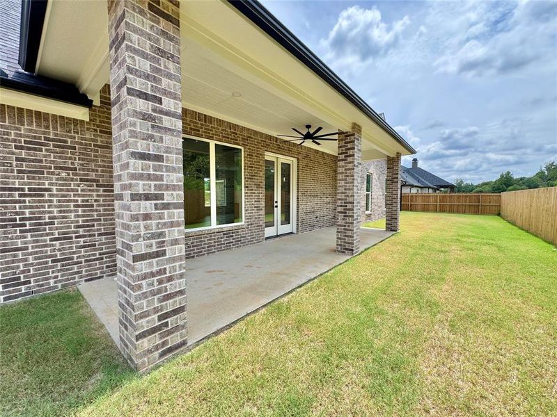 Exterior details and patio area of a home in , Lindale (Image 3).