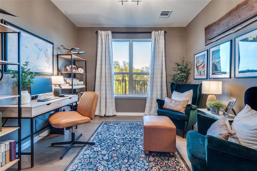 Office area featuring wood finished floors