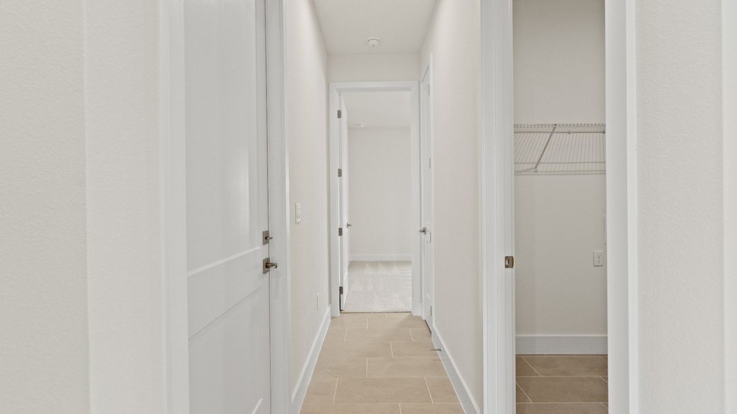 Representative unfurnished interior of a home built from the Longleaf by DRB Homes in Lakeside at Satilla, St. Cloud (Image 27).